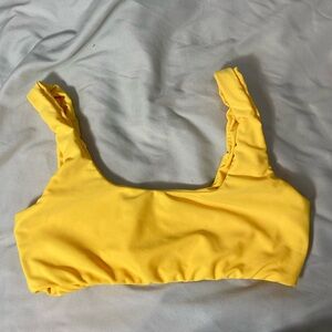 Yellow sports bra style swimsuit top